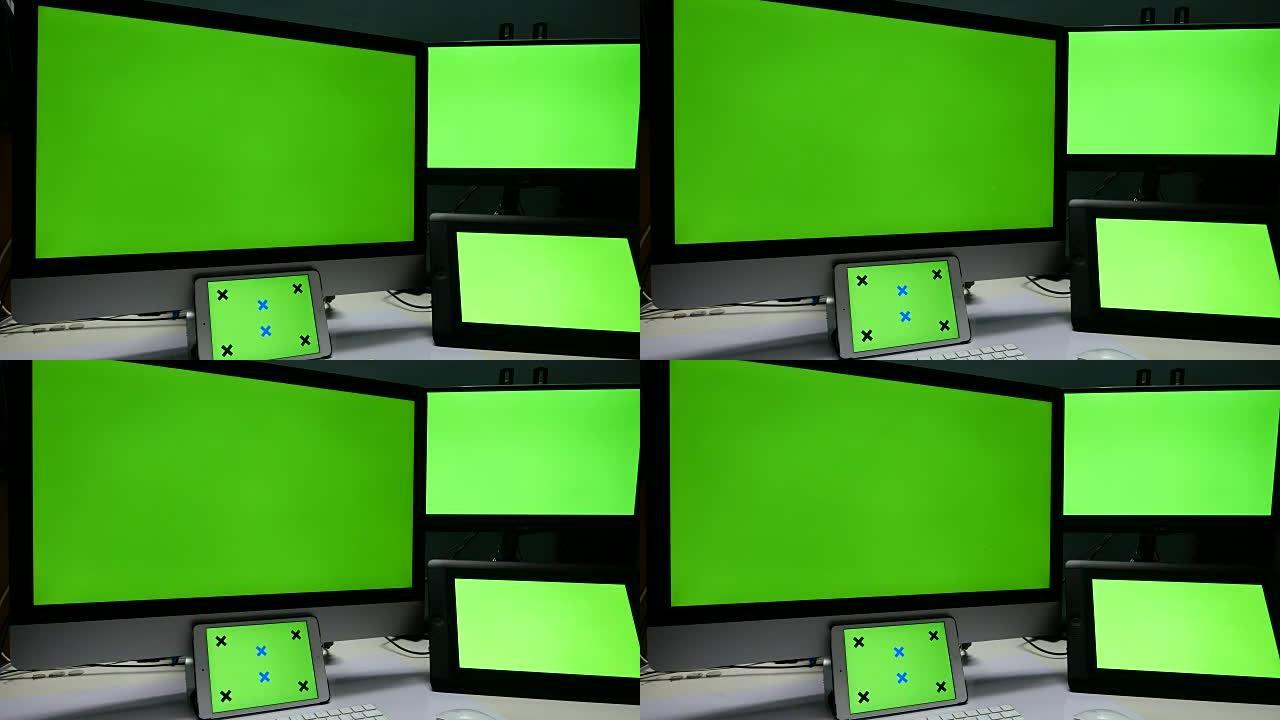 4K: 显示器展示，桌子上的绿屏显示