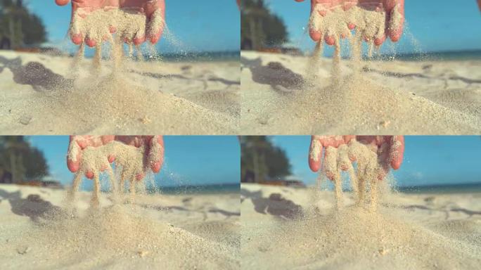 特写: 无法辨认的女人在柔软的指尖之间筛粗沙。