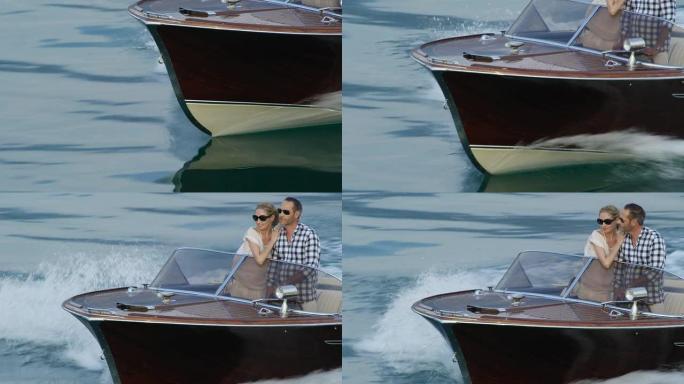 情侣在游艇上开车冲浪