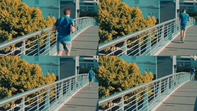 男子在桥上慢跑体育锻炼身心修养陶冶情操
