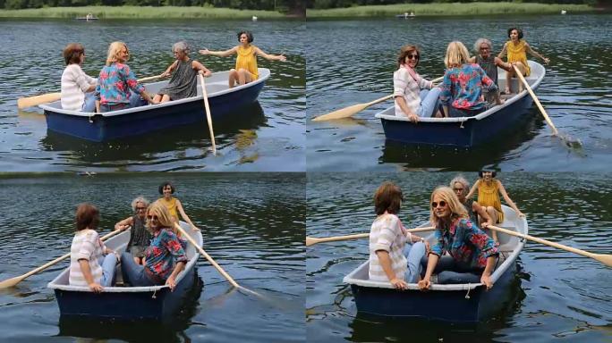 活跃的女性朋友喜欢在湖里乘船