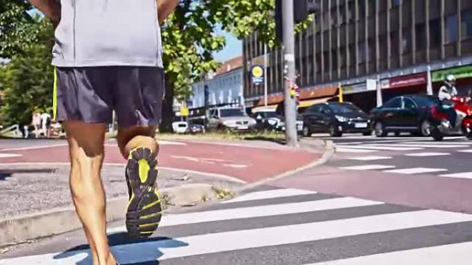 城市人行横道上的慢跑者