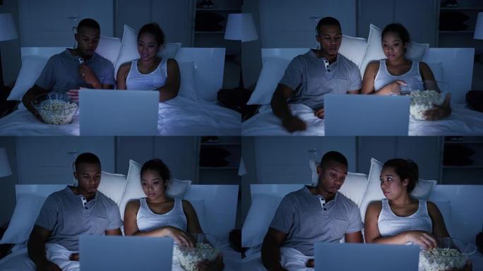 看电影的便捷方式夜晚看电脑的夫妻
