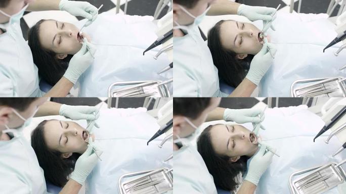 牙医的年轻女子视频素材检查升格口腔清洁洗