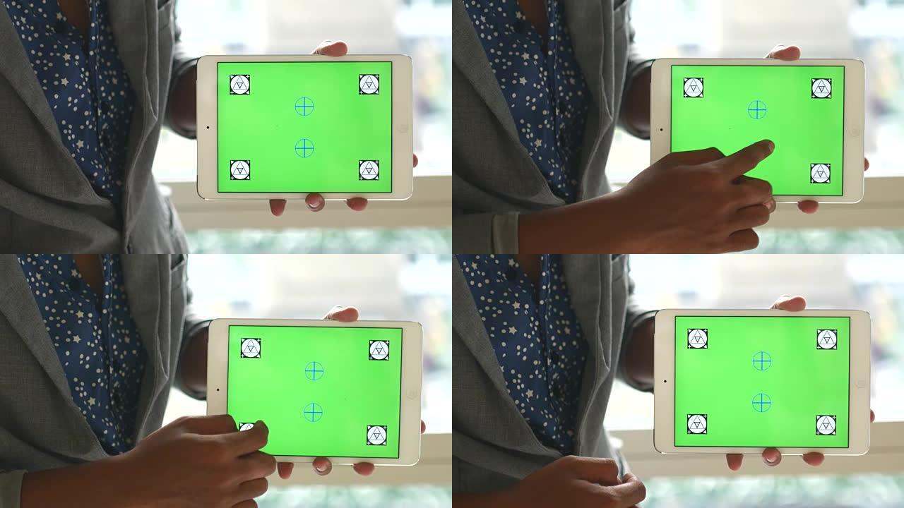 4K: 商人用绿屏显示他的数字桌子