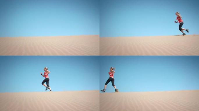 做运动的女人沙漠跑过镜头沙漠跑步沙地训练