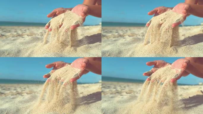 特写: 面目全非的女人让微风扫除她手中的沙子。