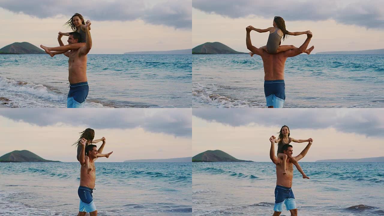 父亲和年幼的女儿亲情陪伴母女父女海边游玩