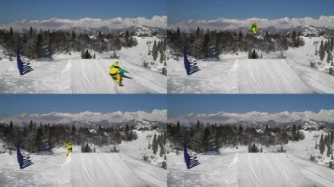 雪地滑板运动员在雪地公园跳跃
