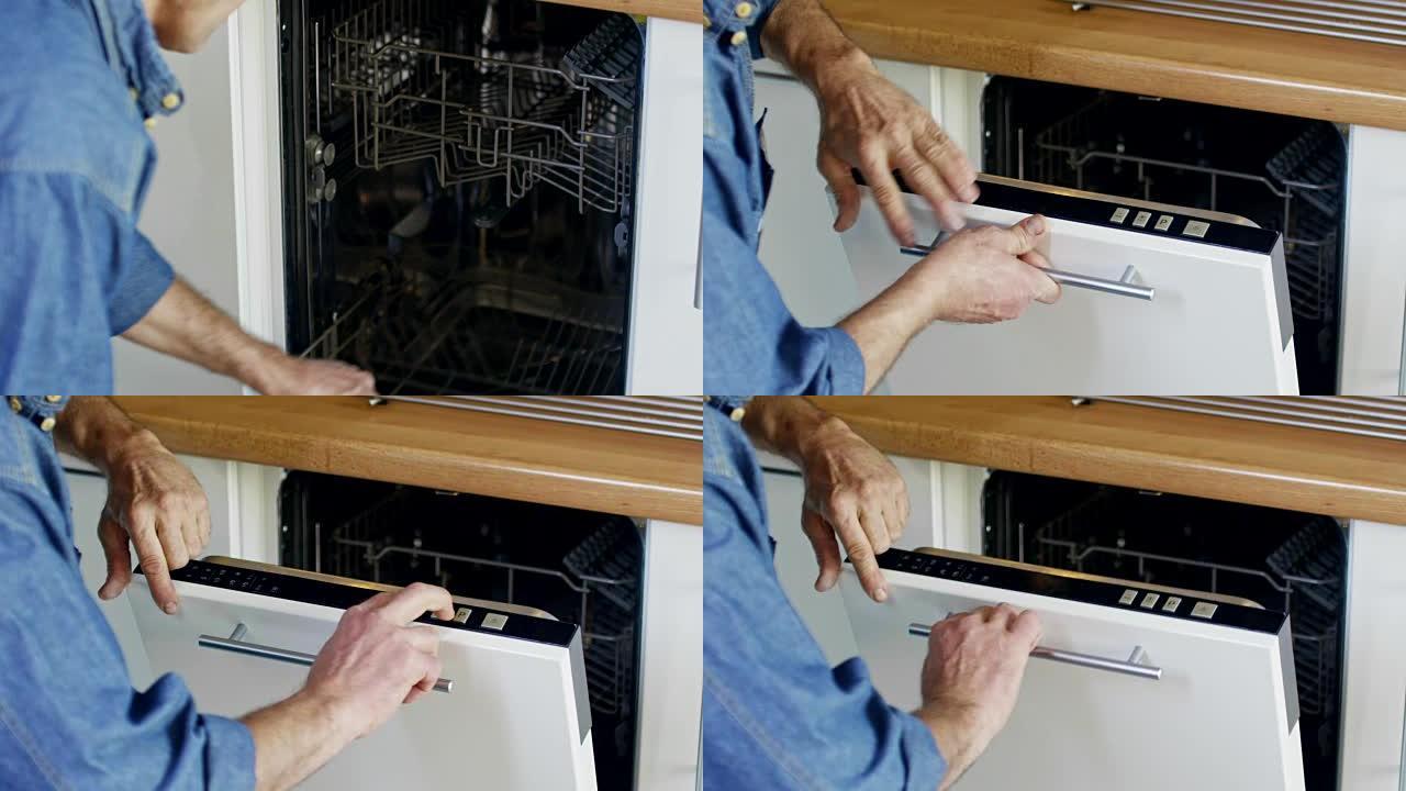 男性电器修理工安装洗碗机
