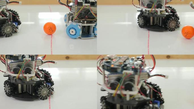 自主移动机器人踢足球。机器人踢足球或足球。机器人当人们踢球并进球时。