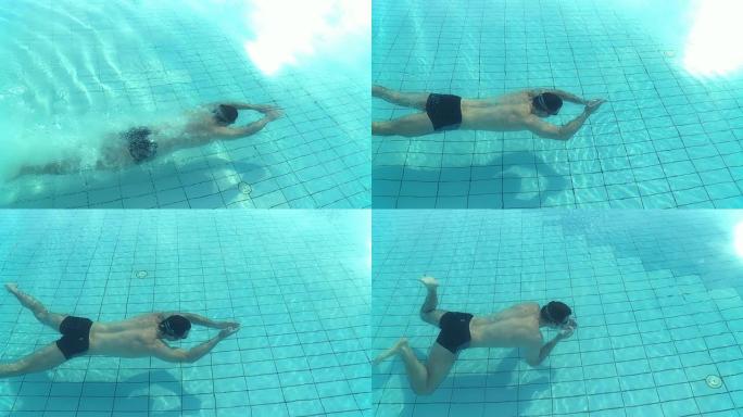 高清慢速动作：专业游泳运动员跳入水中