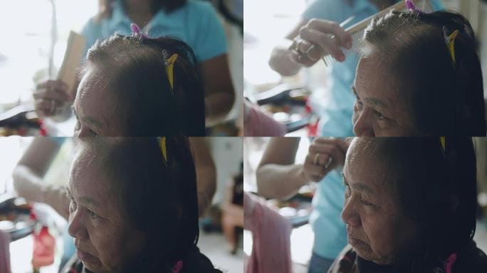 专业美发师，资深亚洲女性在沙龙理发和造型
