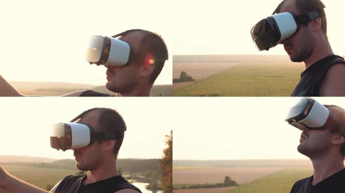 年轻人在美丽的日落中在大自然中使用虚拟现实眼镜