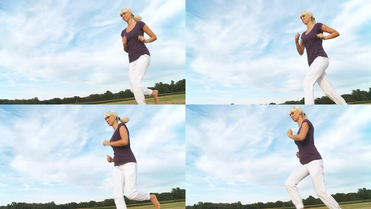 高清稳定镜头：女人在大自然中慢跑