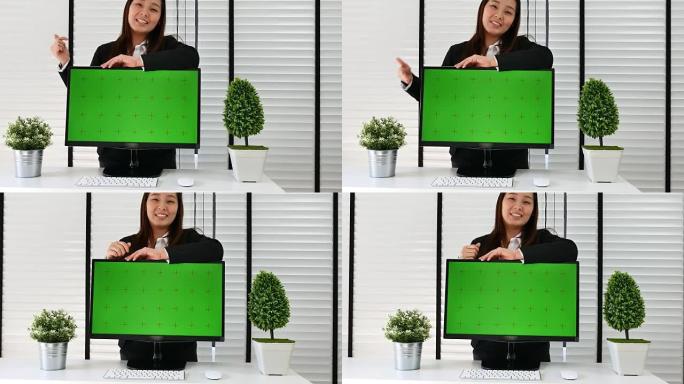 绿屏女商人演示电脑显示屏