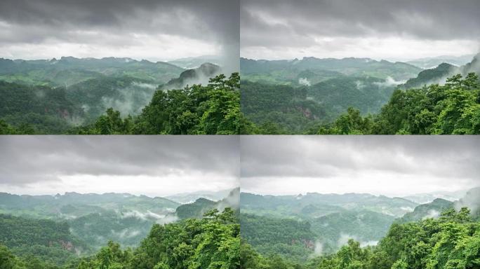山的时间流逝和移动的薄雾多云的雨林，自然镜头背景