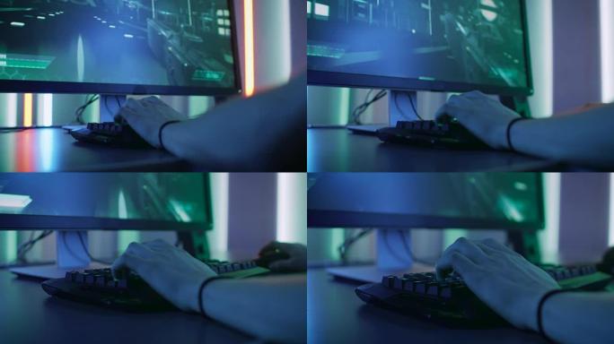 使用键盘在在线第一个Preson射击游戏中玩的游戏玩家手中的特写镜头。时尚的街机霓虹灯亮红色，粉红色