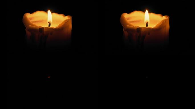 大蜡烛在黑暗中吹灭