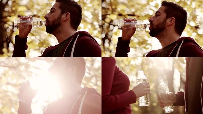 男人和女人拿着一瓶水