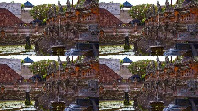 巴厘岛印度教寺庙的SLO MO喷泉和池塘