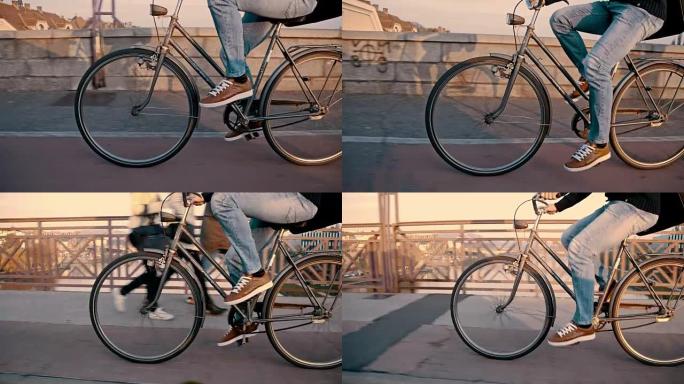 SLO MO年轻人骑自行车过桥