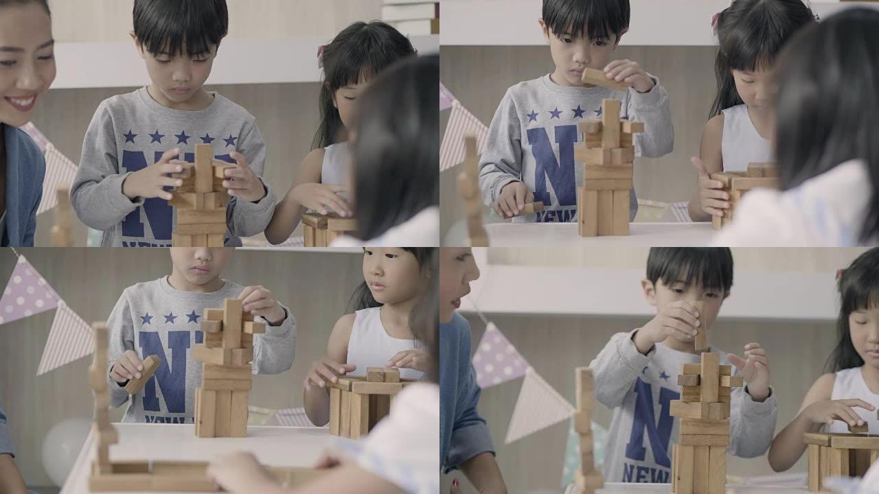 亚洲儿童建造木块