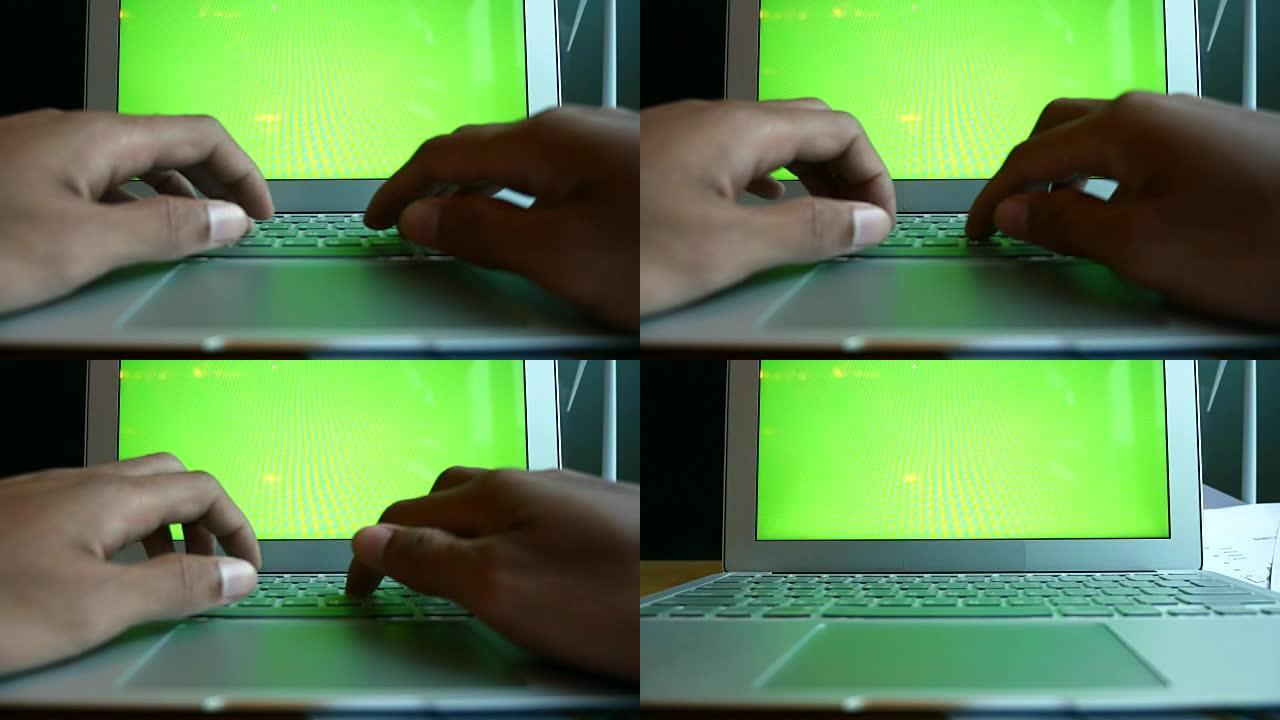 商人打字笔记本电脑绿屏，4k(UHD)