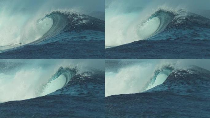 慢动作: 美丽的深蓝色管波在一个阳光明媚的日子在太平洋卷曲。