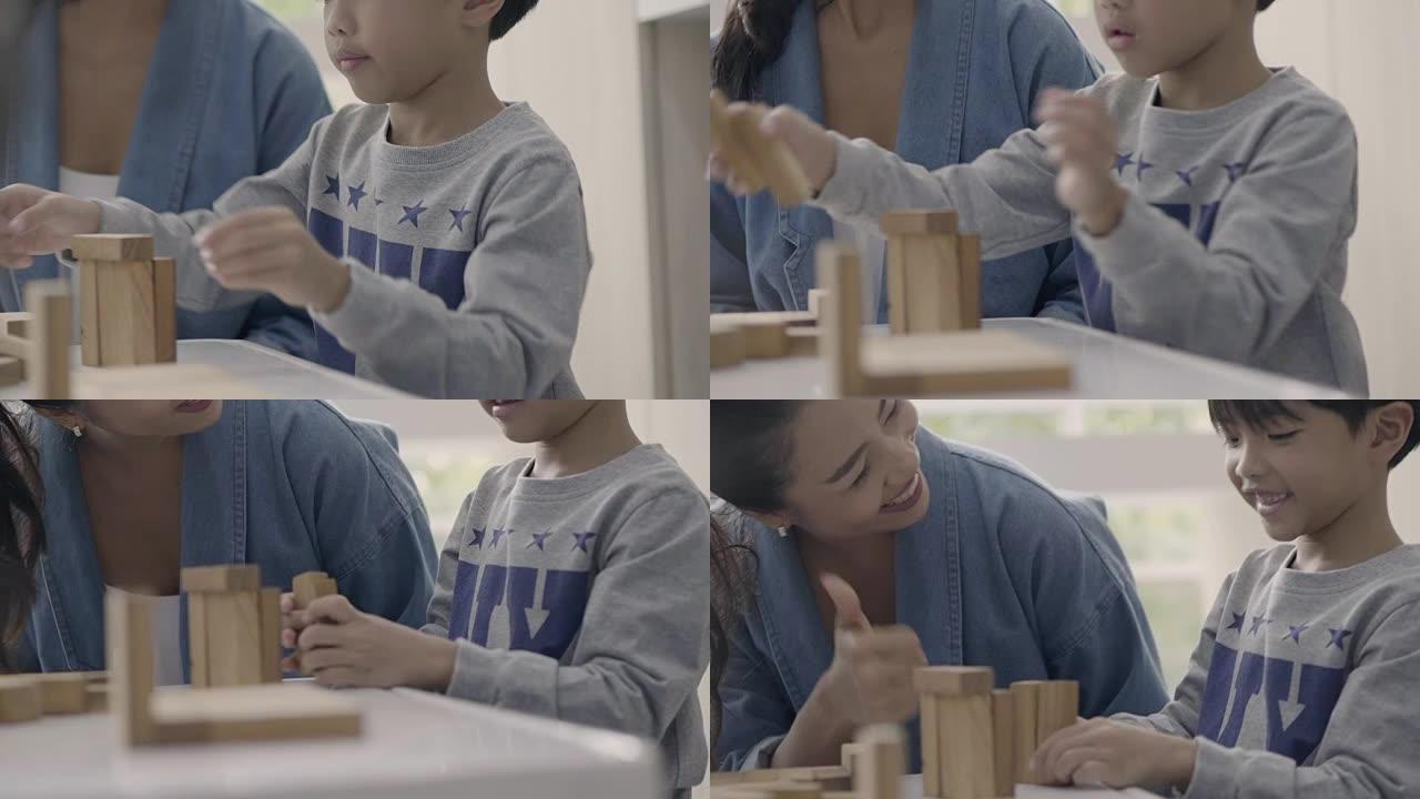 亚洲孩子建造木块
