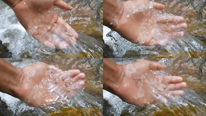 手与溪水
