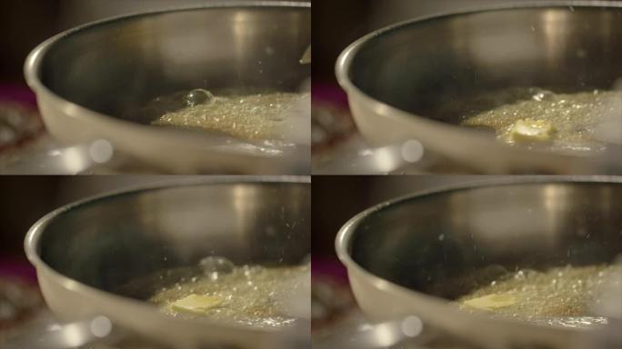 黄油在热锅中融化