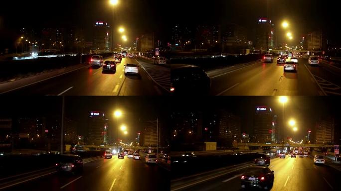 中国北京夜间驾驶的POV侧视图