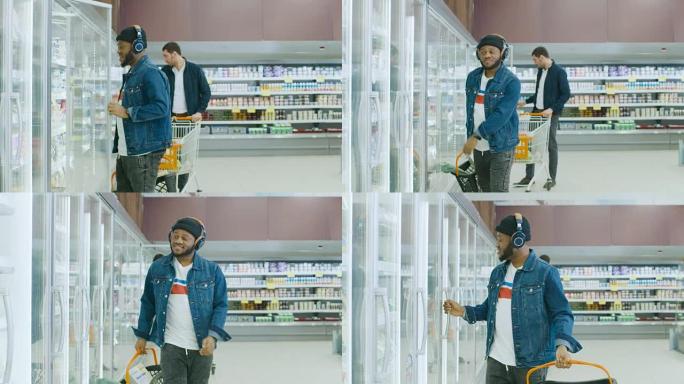 在超市: 带购物篮的时尚非洲裔美国人在商店的冷冻商品区选择产品。他打开大玻璃门冰箱。慢动作。