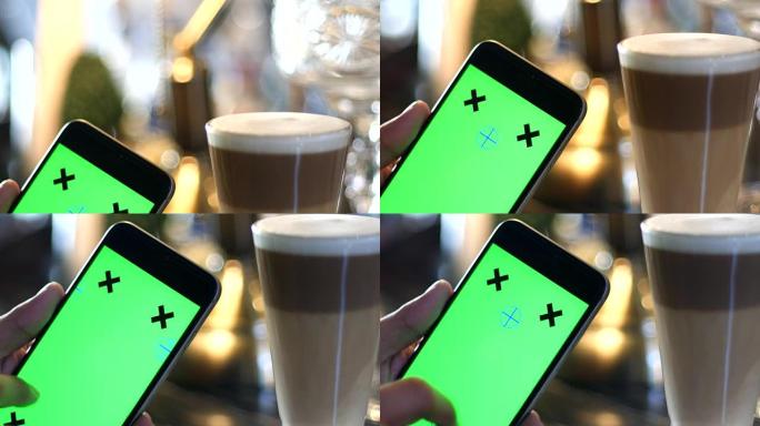 4K: 在咖啡屋使用手机，绿屏