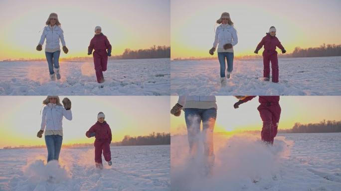 SLO MO母亲和女儿踢雪