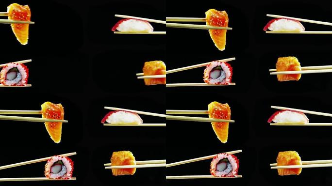 寿司质量高打开黑色背景，显示其所有的美味，饮食和健康的食物，咸味，寿司与鲑鱼或金枪鱼搭配很好，是典型