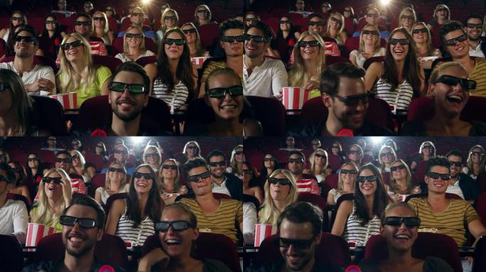 观看3D电影的人一群外国人电影院首映