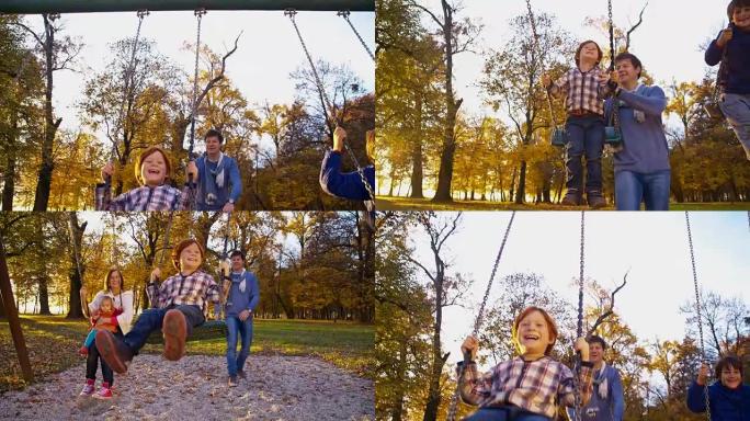 SLO MO家族在公园的秋千上玩耍