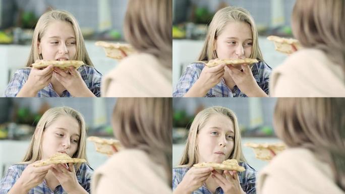 母女吃披萨外国女孩子吃披萨吃早餐