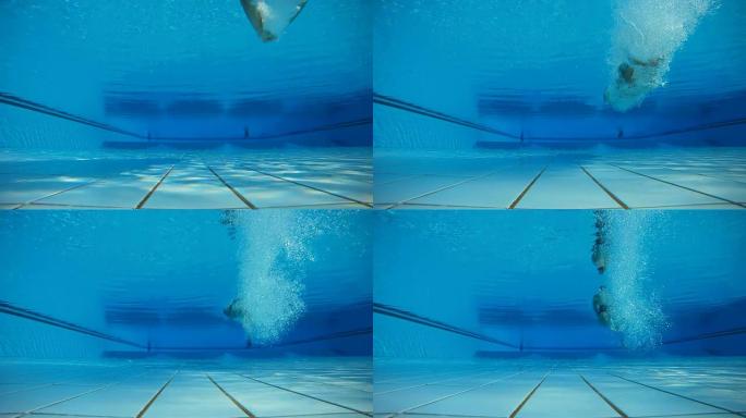 高清慢速动作：跳进水池的水下镜头