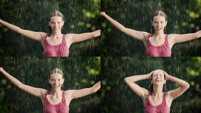 女人在夏雨中享受并伸展她的手臂
