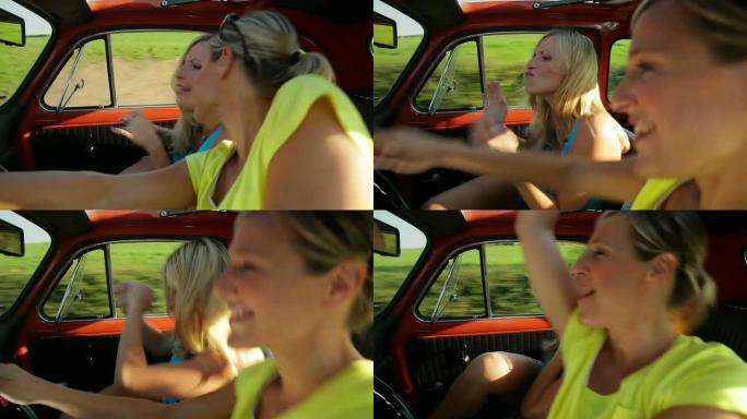 两个女孩开车车内视角愉快的开车