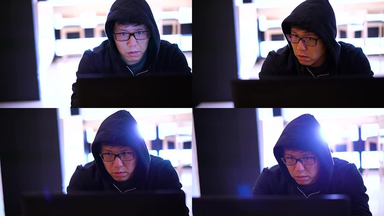CU偷偷摸摸的亚洲男子谨慎使用笔记本电脑