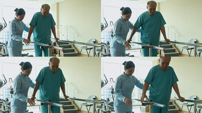 物理治疗师帮助老年人在康复中心使用步行酒吧