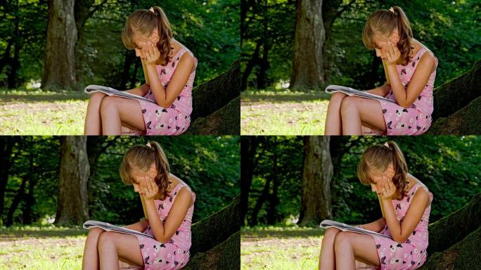MS DS小女孩在公园里读书