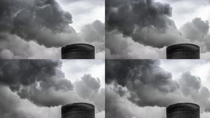 乌云密布的烟堆烟囱污染废气排放变暖化工火