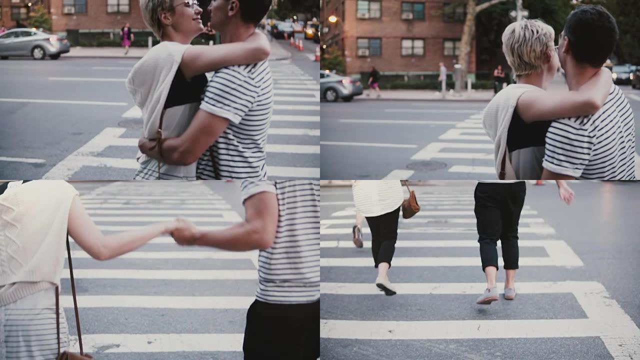 慢动作快乐有趣的多种族夫妇在纽约市的街道人行横道上拥抱、跳舞和跳跃