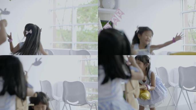 玩黄金气球的小女孩