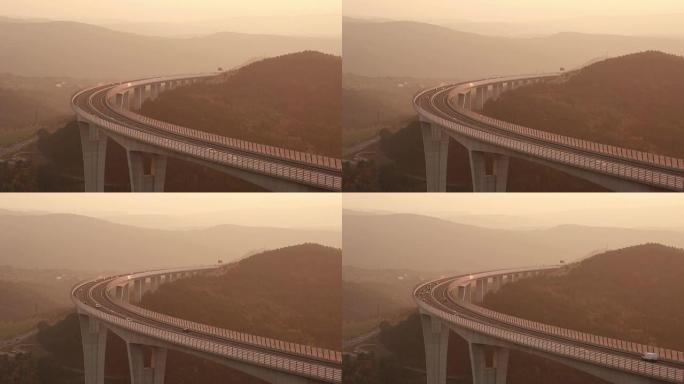 日落时分，车辆在高架桥上飞驰而过